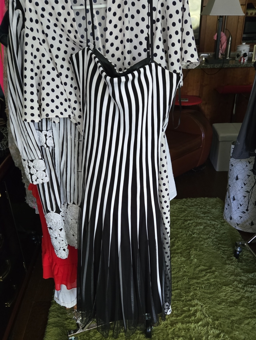 high-end designer pieces characterized by bold, vertical monochrome stripes and